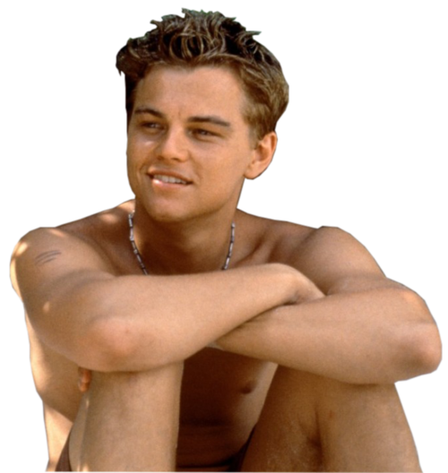 A young Leonardo DiCaprio wearing a bathing suit a looking happy.